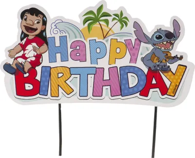 A cake topper with cartoon characters Lilo and Stitch on a tropical background, wishing a happy birthday.