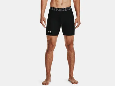 A man wearing black Under Armour compression shorts.