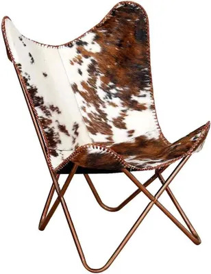 Zdjęcie produktu dla Fotel "Motyl" obity skórą cielęcą, wymiary 74x66x90 cm, vintage'owy fotel skórzany, ergonomiczny, ręcznie wykonany, wytrzymały i trwały, idealny do salonu, sypialni i biura