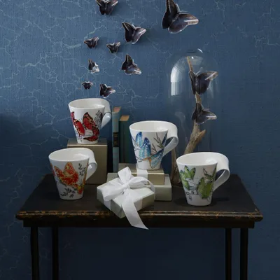 Imagen del producto de NewWave Caffè, taza Morpho cypris con asa (caja de regalo), 130 x 95 x 113 mm | Villeroy & Boch | N.º de artículo: 1041929100 | EAN: 4003686306486