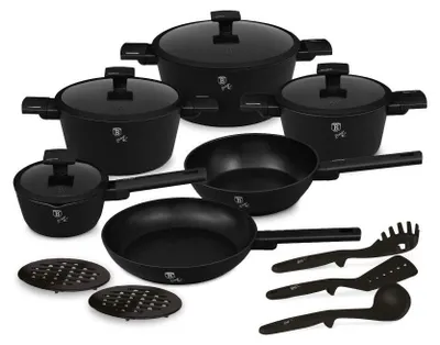 A collection of black cookware and utensils arranged on a white background.