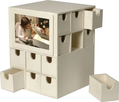 A wooden advent calendar with a picture of a girl opening a gift.