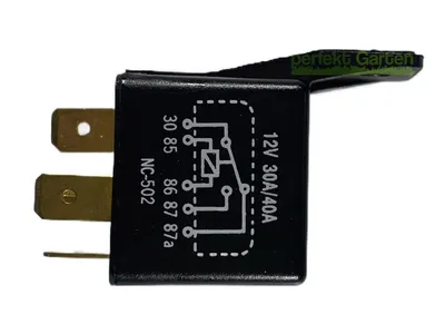 A black electrical relay with gold-colored metal connectors and a schematic diagram printed on its side.