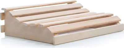 A wooden headrest for a sauna, shown from a side angle on a white background.
