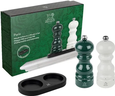 A gift set of Peugeot Paris pepper and salt mills with a tray, presented in its original packaging.