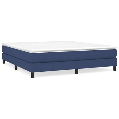 A blue boxspring bed frame with a white mattress on top, shown from the side against a white background.