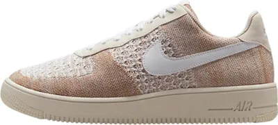 A side view of a Nike Air Force 1 Jewel sports shoe.