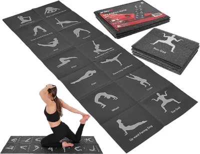 A woman is demonstrating a yoga pose on a yoga mat with various yoga poses illustrated on it. There are also stacks of yoga mats in the background.