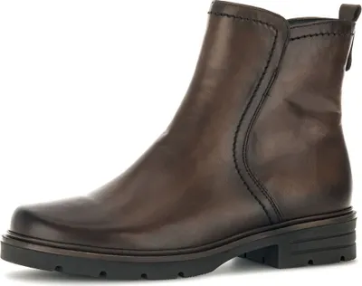 A single brown leather boot is shown against a white background.