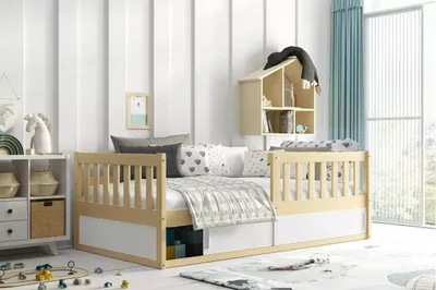 A child's bedroom with a wooden bed, toys, and decorations.
