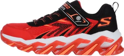A side view of a single red and black Skechers sneaker with orange accents and a white sole.