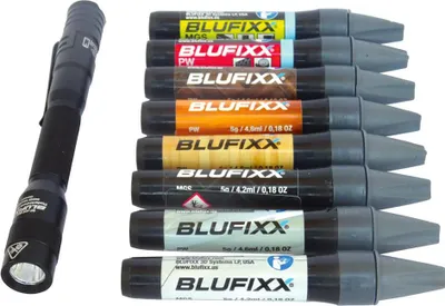 A flashlight and a set of repair pens are displayed against a white background.