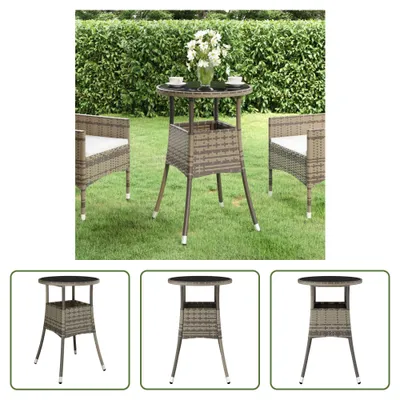 Zdjęcie produktu dla Stół ogrodowy Living Store Ø60x75 cm szkło hartowane i polirattan szary