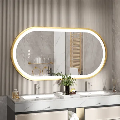 A modern bathroom vanity with a large oval LED mirror above two sinks.