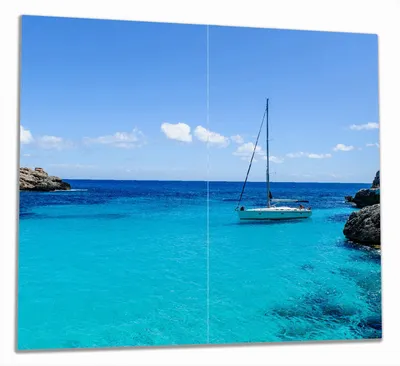 Produktbild von Wallario Herdabdeckplatte aus Glas, Größe 60 x 52 cm 2-teilig, Motiv Segelboot in der Bucht