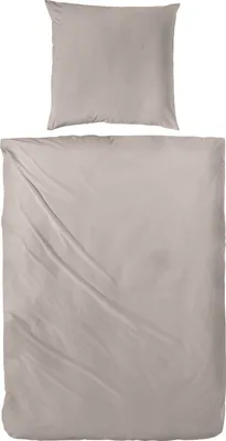 A beige duvet cover and pillowcase laid flat against a white background.
