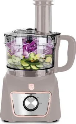 A food processor filled with chopped vegetables, shown from the front.