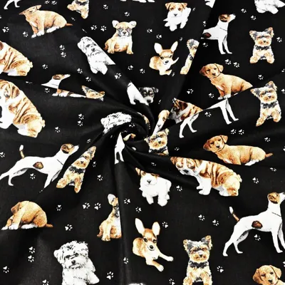 Produktbild von Baumwolle 100% Hunde beige-weiß auf schwarzem Hintergrund