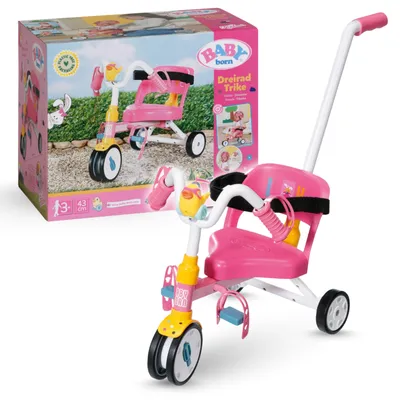 A product shot of a BABY born tricycle and its packaging, set against a neutral background.