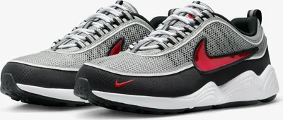 A pair of Nike Air Zoom Spiridon SP "Metallic Silver and Sport Red" sneakers are shown from a diagonal angle against a white background.