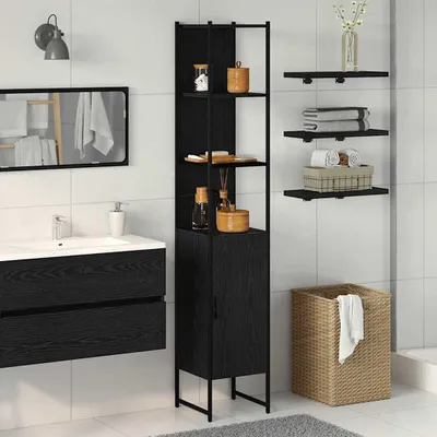A modern bathroom with a black vanity, sink, and a tall black storage cabinet.