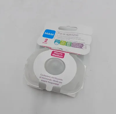 A product package for MAM nipple shields, showing the packaging and the product inside.