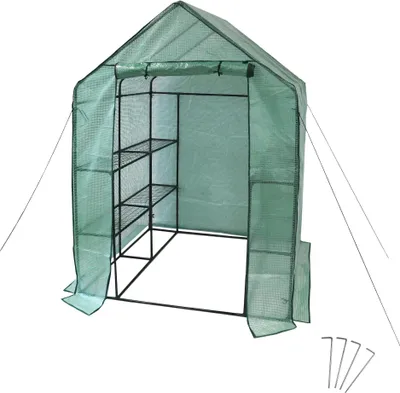 A green greenhouse with shelves against a white background.