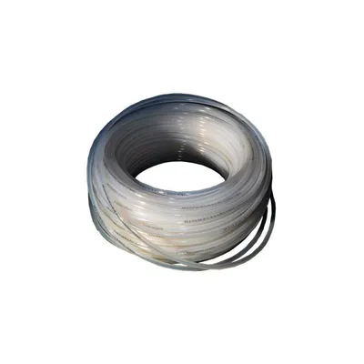 A coiled tube of clear plastic material on a white background.