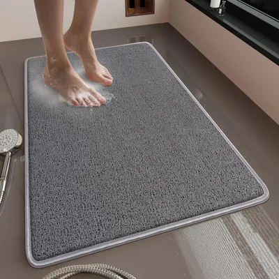 Immagine prodotto di Tappetino da doccia in loofah antiscivolo con sistema di drenaggio