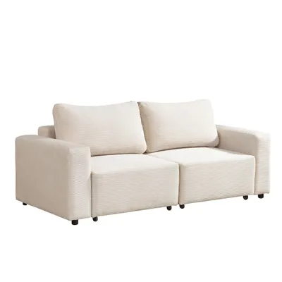 A beige modular sofa with two seat cushions and two back cushions, shown from a side-angle against a white background.
