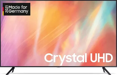 A Samsung Crystal UHD TV is shown on a stand against a colorful, abstract background.