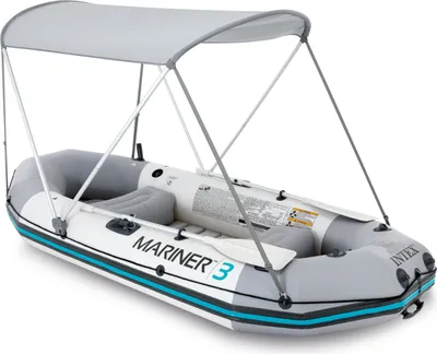An inflatable boat with a canopy is shown against a white background.