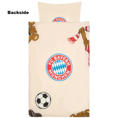 A close-up view of a duvet cover with a cartoon bear mascot and the FC Bayern München logo.