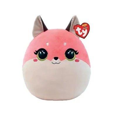A plush toy fox with large, glittery eyes and pink cheeks, sitting against a white background. A red Ty heart-shaped tag is attached to its ear.