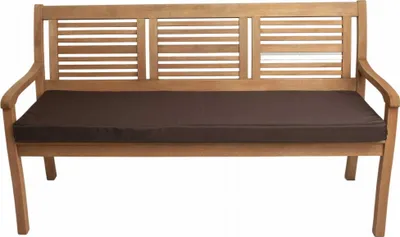 A brown cushion on a wooden bench.