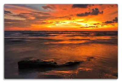 Produktbild von Wallario Frühstücksbrettchen aus Glas 20 x 30 cm mit rutschfesten Füßen, Motiv Glühender Abendhimmel über dem Meer