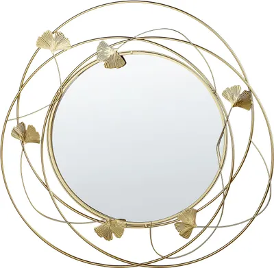 A round gold mirror with a decorative metal frame featuring ginkgo leaf motifs.