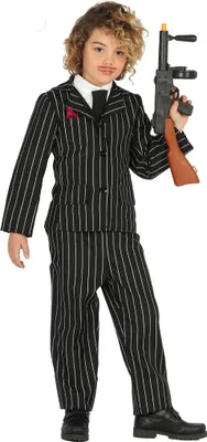 A child wearing a gangster costume from the 1920s.