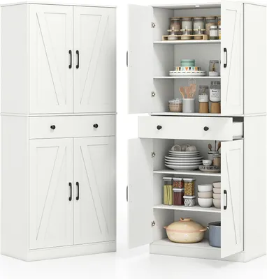 A white kitchen cabinet with its doors open, showing shelves filled with various kitchen items.