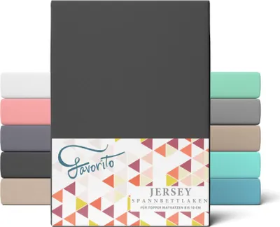 A product image showcasing a stack of folded fitted sheets in various colors, with a prominent dark gray sheet in the foreground and a branded label.