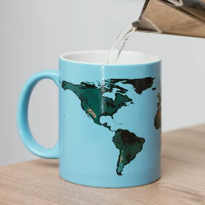 Produktbild von ThumbsUp! Tasse "Erderwärmung" Farbwechsel 300ml blau