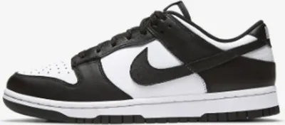 A studio shot of a Nike Dunk Low Retro sneaker in black and white.