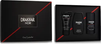A gift set of Drakkar Noir products by Guy Laroche, including EDT, Deodorant Stick, and Shower Gel, presented in a black box with red accents.