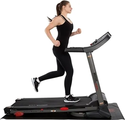A woman running on a treadmill.
