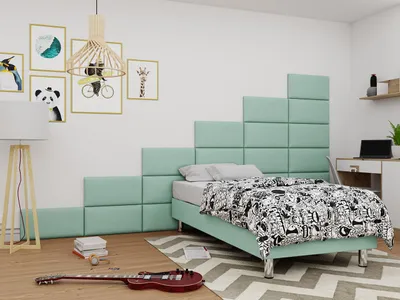 A bedroom with a bed, desk, and decorative wall panels.