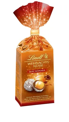 Zdjęcie produktu dla Lindt Christmas Nuts Macadamia w mlecznej czekoladzie 100g