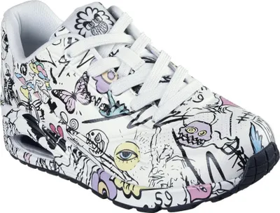 A single white sneaker with a black sole, covered in a black and white doodle-like pattern with some colored accents.
