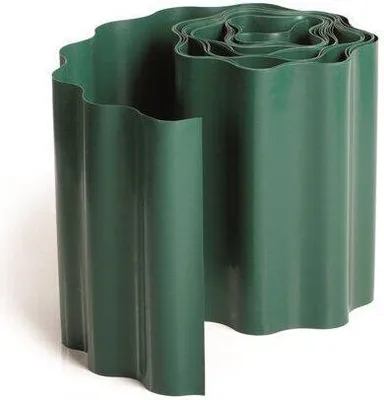 A roll of green garden edging with a wavy pattern.