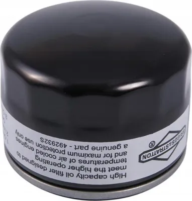 A black oil filter with a white label is shown against a white background.