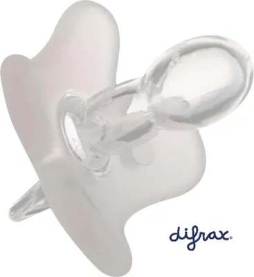 A close-up studio shot of a white silicone pacifier with the brand logo in the bottom right corner.